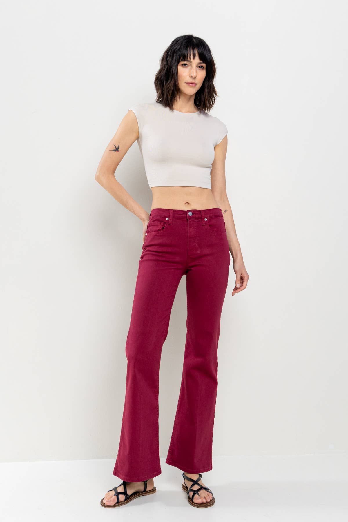 Patti High Rise Solid Slim Bootcut in Cabernet Jeans