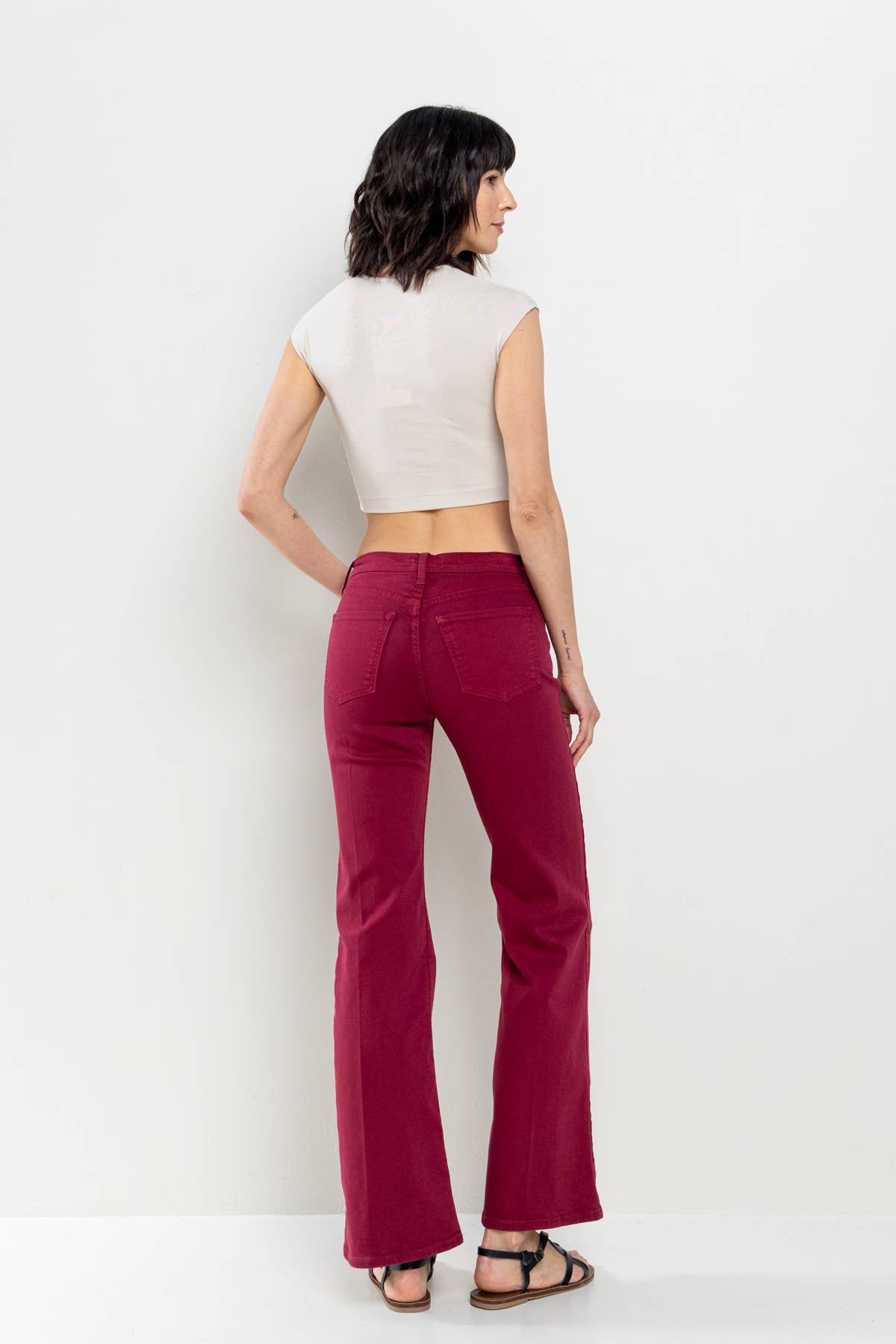 Patti High Rise Solid Slim Bootcut in Cabernet Jeans