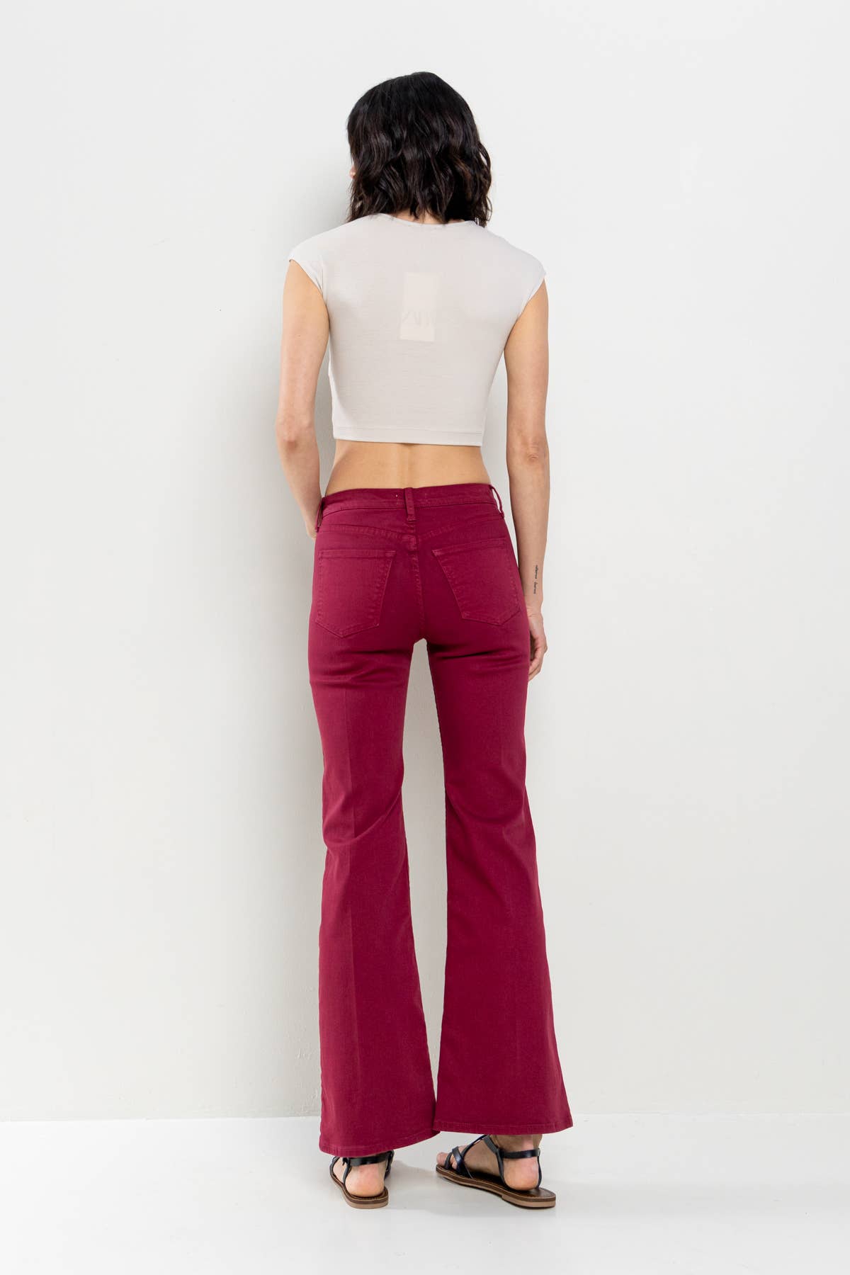 Patti High Rise Solid Slim Bootcut in Cabernet Jeans