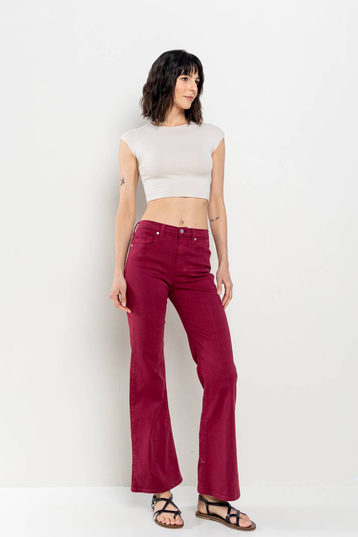 Patti High Rise Solid Slim Bootcut in Cabernet Jeans